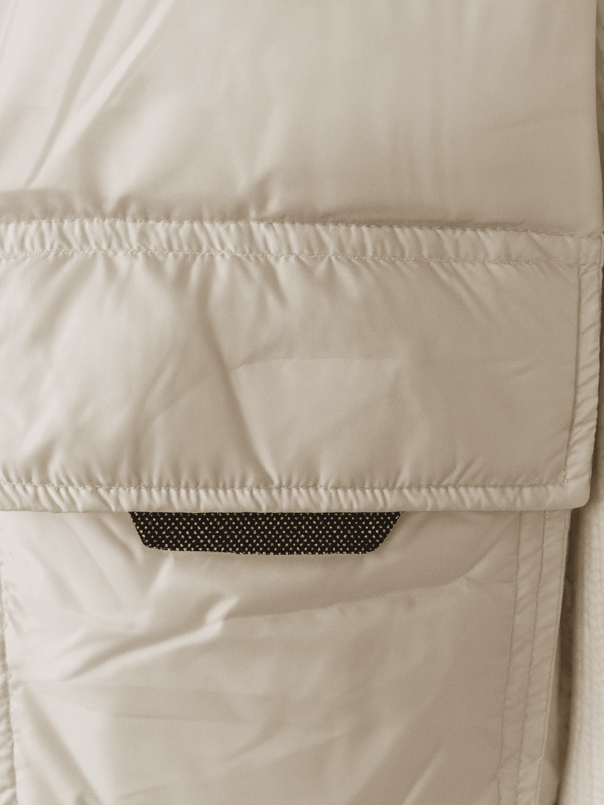 Kurtka puchowa z wełnianymi rękawami