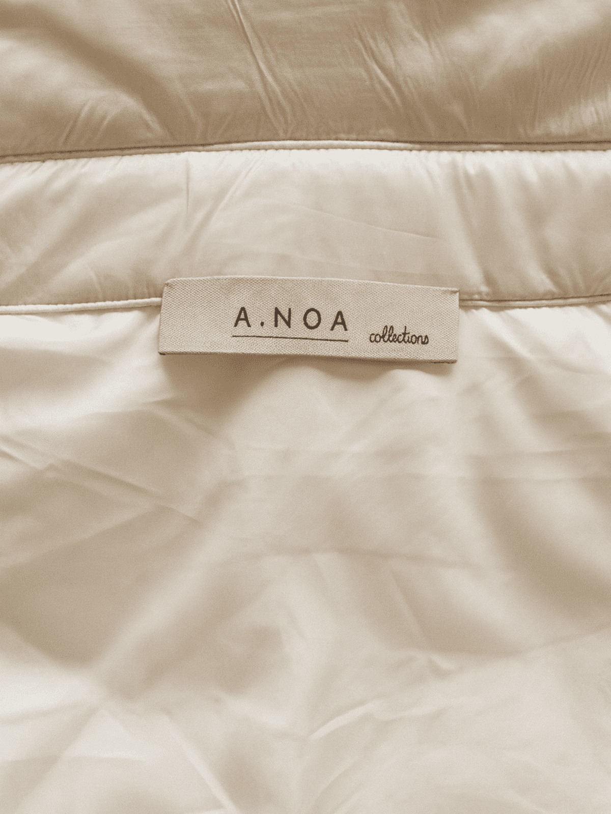 Kurtka puchowa z wełnianymi rękawami