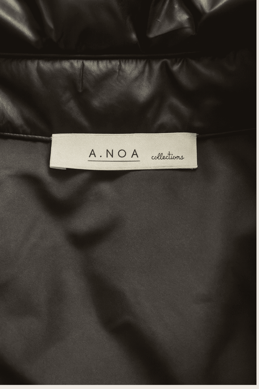 Kurtka puchowa z wełnianymi rękawami